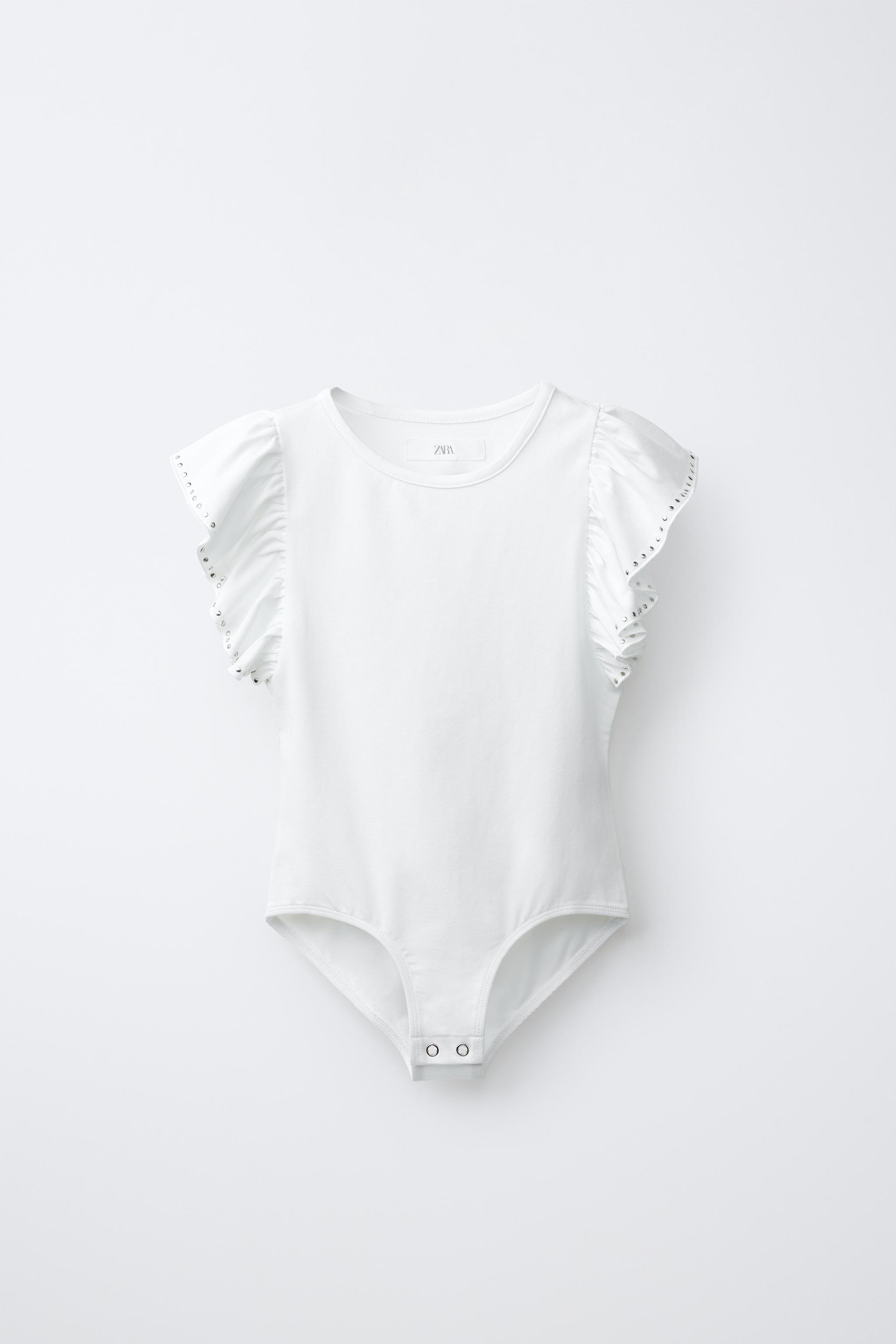 RUFFLED BODYSUIT WITH STUDS AND MODAL